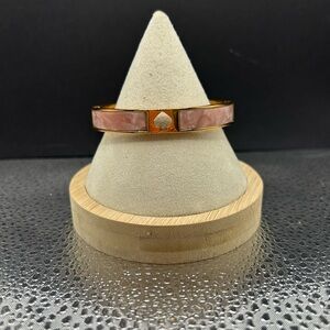 Kate Spade Gold and Pink Bracelet with Chic Design